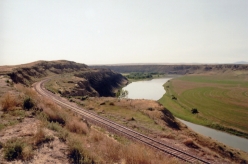 Just west of Ft. Benton, MT, the GN rides along the bluffs above the Missouri.