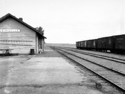 Here is a shot of the tiny town of Virgelle, MT, just south of the Coal Banks bridge,  in 1924. The town consisted of a depot, a grain elevator and not too much more.