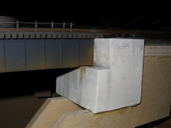 Here is a finished abutment installed on the layout before finishing the scenery.
