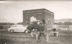 From what looks like the 1940's here is a view of the Virgelle State Bank with a little horsing around in front. Thanks to Jim Griffin of the Virgelle Merchantile in Virgelle, MT.